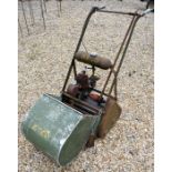 A vintage Atco kick-start mower