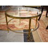 A 1960s brass circular coffee table