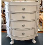 A cream painted demi lune chest with twelve drawers