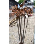 Ten weathered steel double flower head spikes