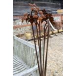 Ten weathered steel single flower head spikes