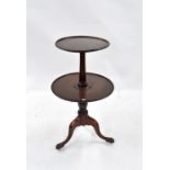 A Victorian mahogany circular graduated two tier dumb waiter