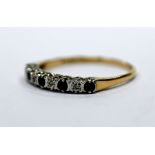 A nine-stone half eternity ring