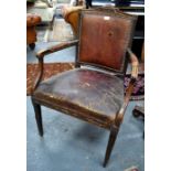 A worn and patinated antique single open arm carver chair