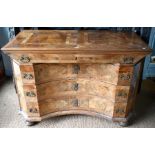 An 18th century continental (South German) inlaid walnut commode