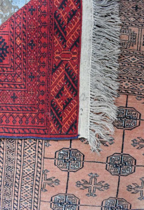A red ground washed Afghan carpet - Image 3 of 3