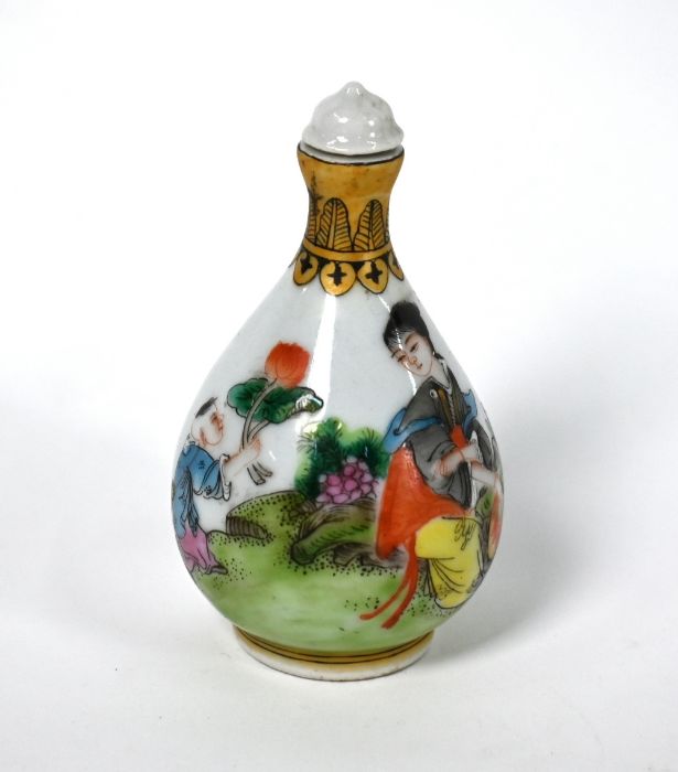 An early 20th century Chinese pear shaped porcelain snuff bottle and stopper