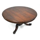 A Victorian rosewood breakfast table