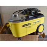 A Karcher commercial Puzzi 100 carpet and upholstery cleaner