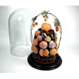 A Victorian waxed fruit display under glass dome