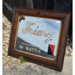 A Friary oak framed advertising mirror