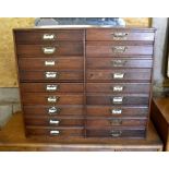 An early 20th century oak sewing/collector's chest