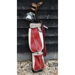 Vintage leather Spalding golf bag and contents