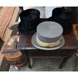 Two antique leather top-hat boxes
