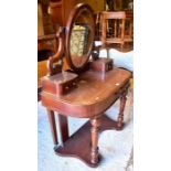 A Victorian mahogany mirror backed demi-line dressing table