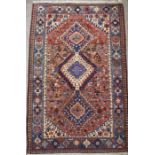 Small Caucasian brick ground rug