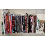 A quantity of comic books and other volumes