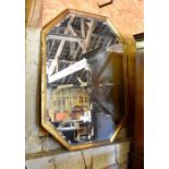 A large bevelled octagonal wall mirror