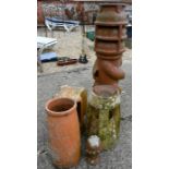 An large old weathered 'Spiralvent' chimney pot and others (5)