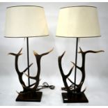 The Original Bookworks Ltd, a companion pair of antler mounted table lamps