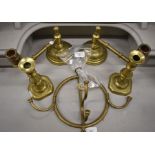 A pair of Victorian brass baluster candlesticks