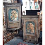 A pair of 19th century continental painted pine hanging corner cabinets