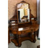 A Victorian 'Duchess' mirror backed serpentine dressing table