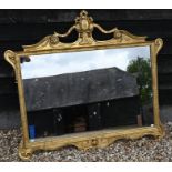 A large modern wall mirror in decorative gilt frame, 125 cm x 115 cm