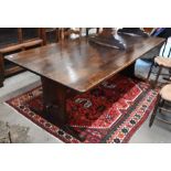 A large oak refectory dining table