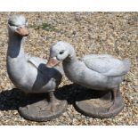 Painted reconstituted stone Goose and Gander garden figures, 55 cm high and 45 cm high