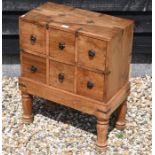 A sheesham hardwood and brass mounted spice chest