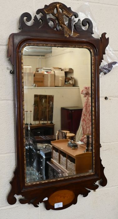 A bevelled wall mirror