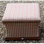 A vintage pink gingham upholstered ottoman box seat