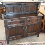 An Ercol Old Colonial dark elm sideboard