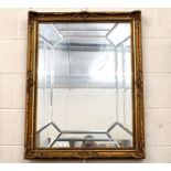 Decorative gilt framed mirror with bevelled glass plates, 92 cm x 72 cm