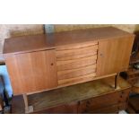 A mid-century teak sideboard