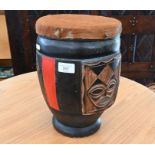 An African carved and painted wood drum with goat-skin top