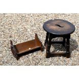 An oak stool to/w an oak bookrack and a vintage leather suitcase