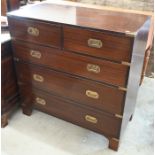 A reproduction mahogany campaign chest of drawers