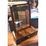 A 19th century mahogany platform toilet mirror with three drawers