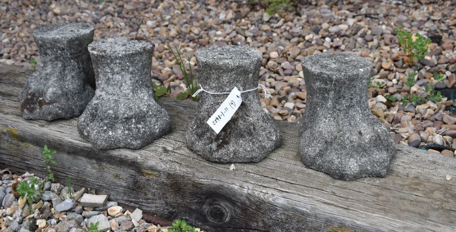 Set of four weathered lion paw feet