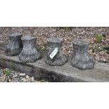 Set of four weathered lion paw feet