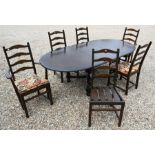 An Ercol Old Colonial extending dining table and set of six chairs
