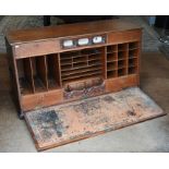 An early 20th century mahogany bureau cabinet