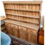 A vintage shallow pine dresser