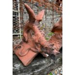 A cast terracotta dragon ridge tile