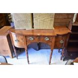 A George III mahogany breakfront sideboard