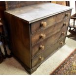 An antique provincial oak chest of four long graduating drawers
