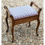 A vintage walnut piano stool