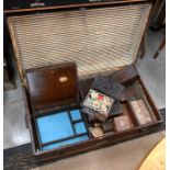 A vintage canvas covered wooden bound trunk